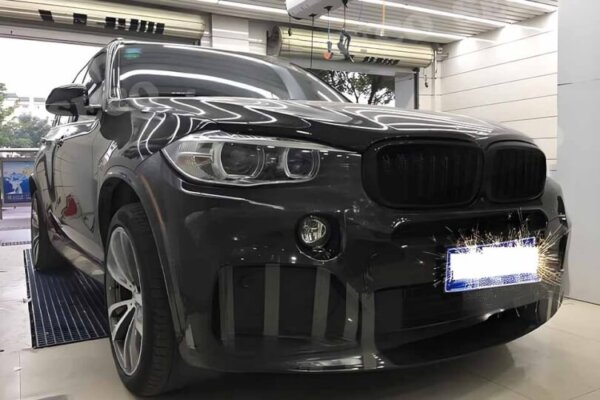 carbon fiber to a car